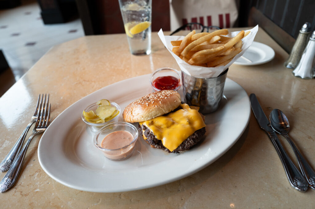 A hamburger with fries at the Cheesecake Factory at Yorkdale Mall in Toronto.