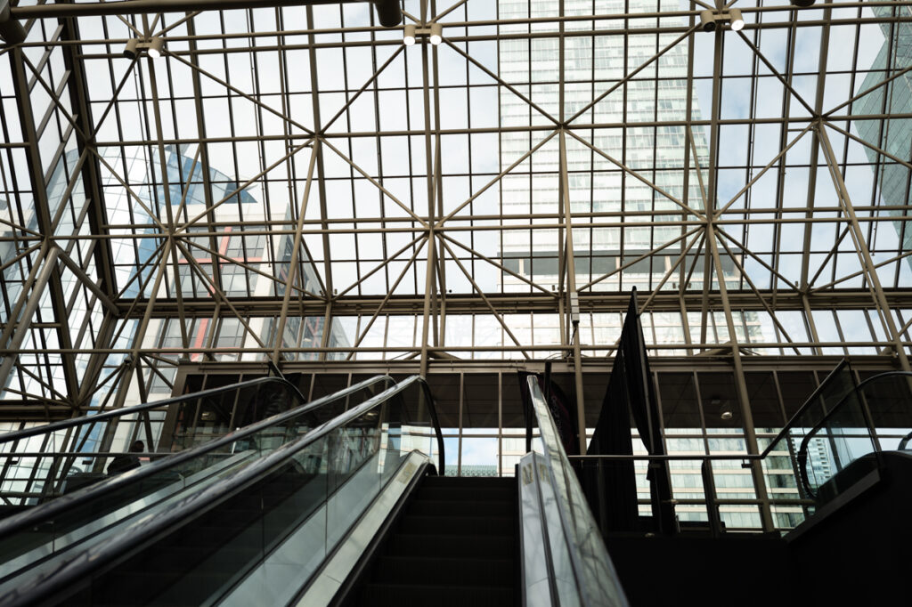 Looking up from the escalator at the atrium in the Metro Toronto Convention Centre.